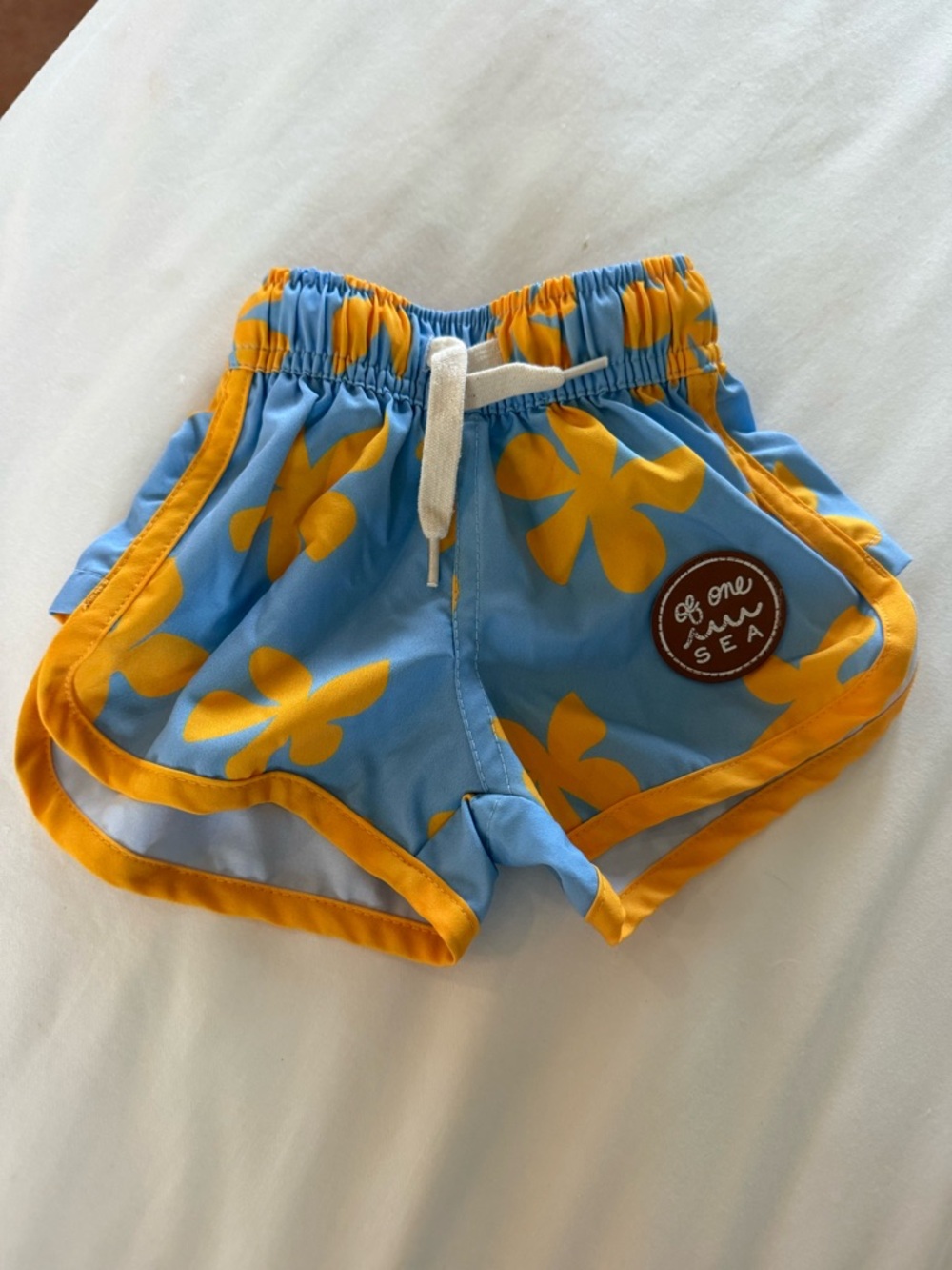 Of One Sea Blue & Yellow Floral Kids Swim Trunks with Drawstring
